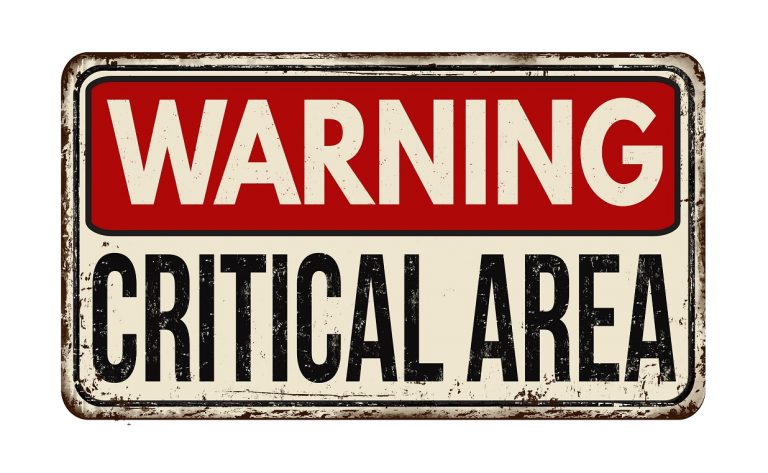 Illustration of a red Critical area warning sign on a white background
